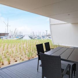 Moderne Marina-Wohnung mit Meerblick, хотел в Wendtorf