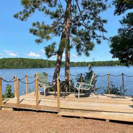 Pine Ridge Resort Cabin on Bass Lake w/ Dock!, hotel em Interlochen