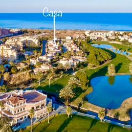 Villa con jardín en Oliva Nova Golf a 100m de la playa