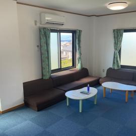 ゲストハウスKOIZUMI, hotel di Oshima