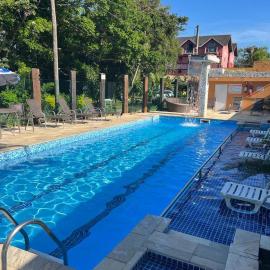 Pousada Acqua Infinity PISCINA CLIMATIZADA PÉ NA AREIA, hotel a Bertioga