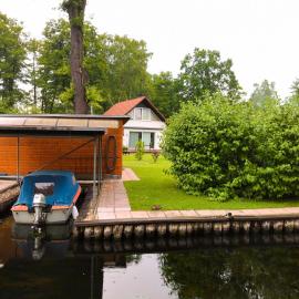 Ferienhaus direkt an der Spree mit Whirlpool und Sauna, Hotel in Berlin