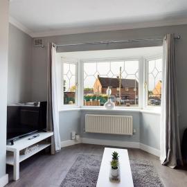 Stunning Family Home with Comfortable Surroundings by Our Home Short Stays ideally situated within Greater Manchester