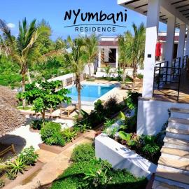 Nyumbani Residence Suites، فندق في جامبياني