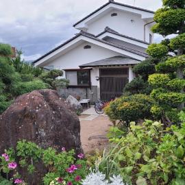 ゲストハウス陽だまりの宿, hotel di Tomi