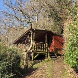 Surfers and walkers cosy camping cabin