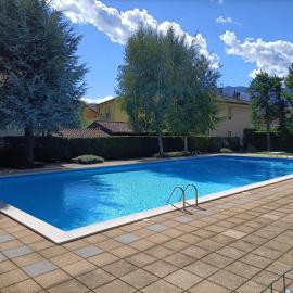 House in a beautiful residence with garden, swimming pool and parking spot - Larihome A07, Hotel in Domaso