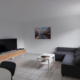 Charmant appartement au rez de jardin d'une maison
