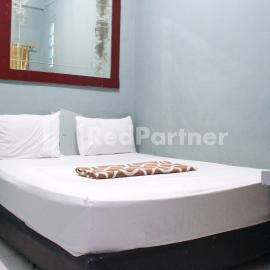 Snow White Residence near Grogol Mitra RedDoorz