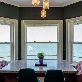 Luxury Penthouse Retreat with Amazing Ocean Views & Log Burner