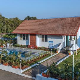 SaffronStays Mariposa Rio- 2BR Goan-style riverside pool villa with machan, garden & bonfire near Mumbai