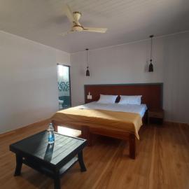 Coral Beach Cottage, hotel i Māvalli