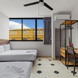 Suites Reforma by HomiRent, готель у місті Меріда