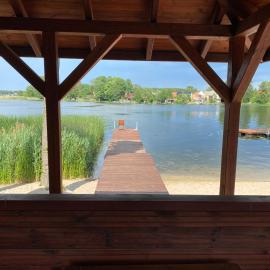 Domek z prywatną plażą Lagomar, хотел в Radzyń
