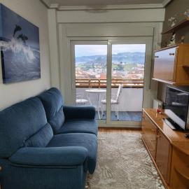 Estudio con vistas a la ciudad con aire acondicionado