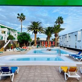 Relaxing upper floor Apartment- exclusive complex.