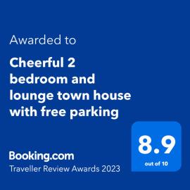 Cheerful 2 bedroom and lounge town house with free parking