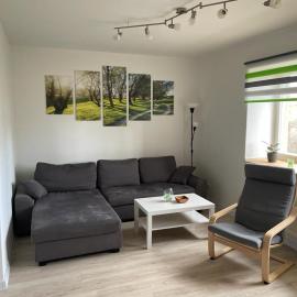 Monteur Ferienwohnungen OT Kleinwaltersdorf mit Außensitzecke und Grill โรงแรมในไฟรแบร์ก