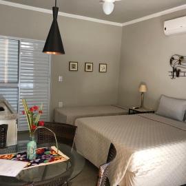 Flats Naturando's โรงแรมในBuritama