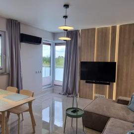 62m2 Apartament PREMIUM Łąki i Pola, ELEKTRYCZNE ROLETY, KLIMATYZACJA, GARAŻ, ŁADOWARKA AUT ELEKTRYCZNYCH – hotel w mieście Suwałki