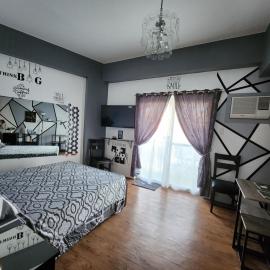 Condo Azur Suites A125 Amani Resorts Residences , 5 minutes Airport, Netflix, Stylish, Cozy with Luxurious Swimming Pool, hotel di Pusok