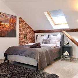Gemütliche, zentrale und schöne Loft Wohnung im Dachgeschoss, מלון בבאמברג