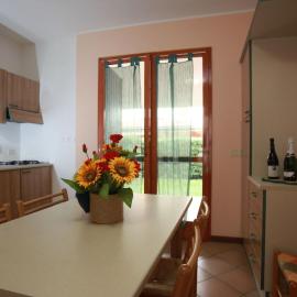Villetta a schiera Salina con giardino privato e portico – hotel w mieście Rosolina Mare