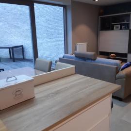 Appartement met ruim terras en garagebox te Westende