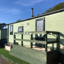 Cosy holiday caravan minutes from the beach, hotel in Aberystwyth