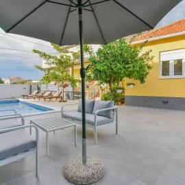 Holiday homEna with a heated pool