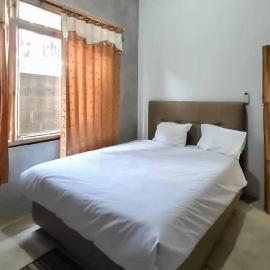 Viesnīca Sukawana Guest House Mitra RedDoorz pilsētā Babakan