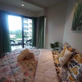 CEBU's Best Staycation at Tambuli Seaside Living Tower C, хотел в Maribago