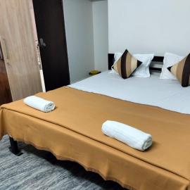 SMS HOME STAy, хотел в Кушалнагар