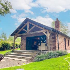 Waters Edge, Talkin Tarn, a luxurious bungalow with stunning views over the tarn