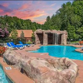 LUXURY 4BR Cabin in Gatlinburg with Views Hot Tub with Private Deck Game Room Most Popular Coffee Bar Perfect for Family Getaway Tennis Courts Infant Crib and Karaoke System