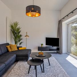 Luxe strandappartement met zonneterras & parking