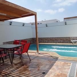 Cómoda casa con piscina, Hotel in Arica
