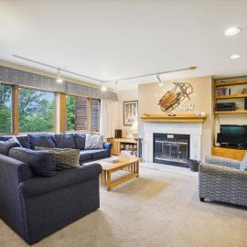 Enjoy this spacious three bedroom three bathroom Highridge Condo B1