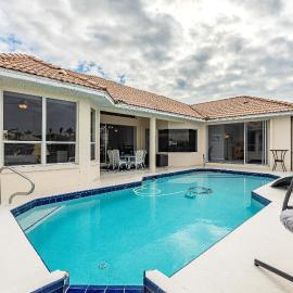 Waterfront, Canal, Heated Pool, Sleeps 8 - Villa I'm Hooked - Roelens Vacations