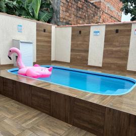 Casa iguaba com área de lazer