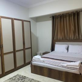 Comfort Suite Near Triumph Luxury Hotel