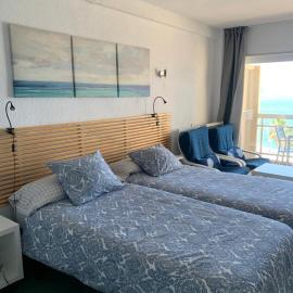 Apartamentos Chinasolymar, хотел в Алмунекар