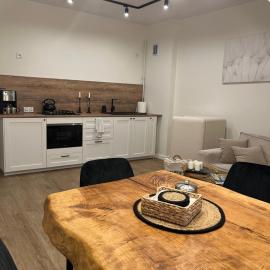 Apartamenty Aleja Jana Pawła II, готель у місті Вонґровєц