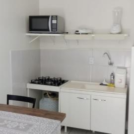 Apto 10: sala/cozinha,1quarto(ar e 2 camas)c/garag, hotel in Cascavel