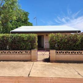 The House with the Purple Gate