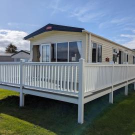 Beautiful Pet Friendly Southerness Caravan With Sea View & Decking Area, hotel in Mainsriddle