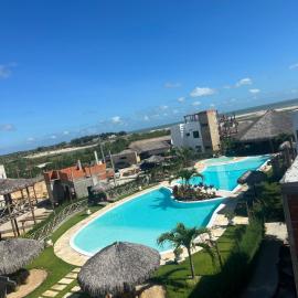 Chalé em condomínio beira mar, hotel u gradu Barrinha