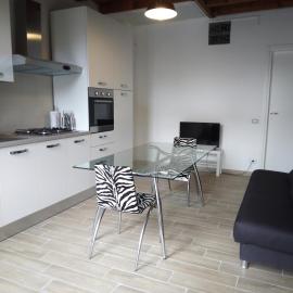 Rho appartamento in centro، فندق في رو