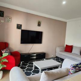 Duplex bien equipe securise avec jardin et veranda