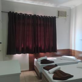 Pousada Quarto Familiar com ar,frigobar,wi fi, garagem